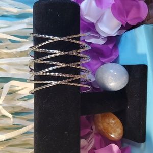 Cuffed bracelet, silver toned beautiful design. Rock it with jeans & a T.